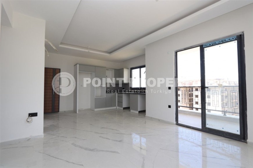 Современный дуплекс 100 м² с двумя спальнями и живописным видом в Махмутларе-id-8574-фото-2