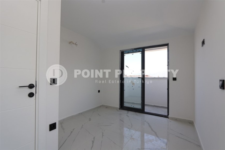 Современный дуплекс 100 м² с двумя спальнями и живописным видом в Махмутларе-id-8574-фото-5