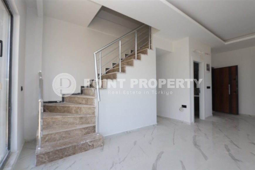 Современный дуплекс 100 м² с двумя спальнями и живописным видом в Махмутларе-id-8574-фото-6