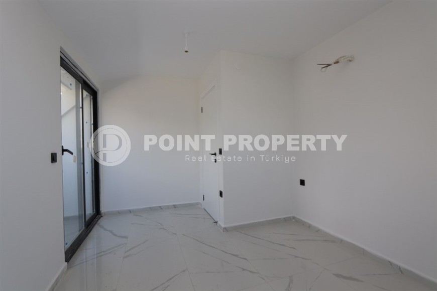 Современный дуплекс 100 м² с двумя спальнями и живописным видом в Махмутларе-id-8574-фото-7