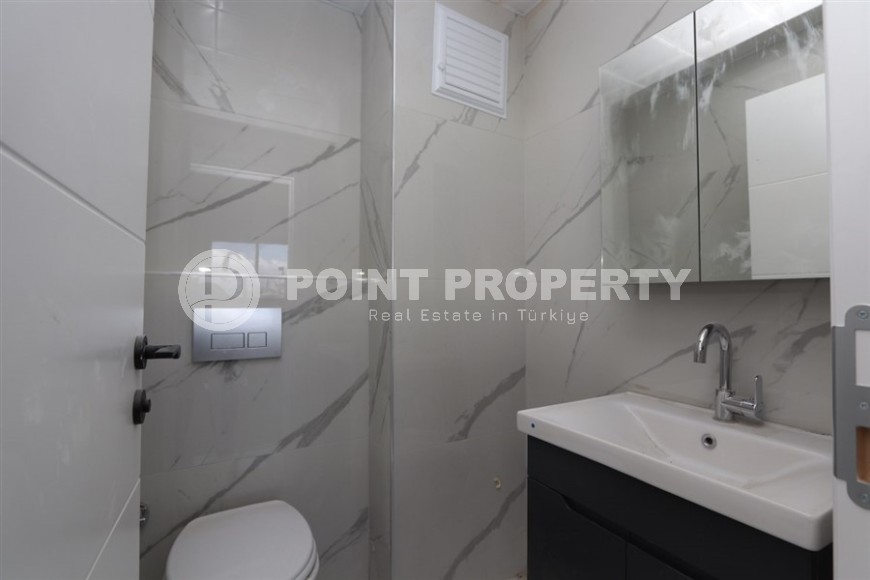 Современный дуплекс 100 м² с двумя спальнями и живописным видом в Махмутларе-id-8574-фото-9