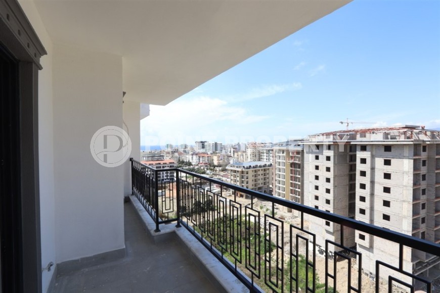 Современный дуплекс 100 м² с двумя спальнями и живописным видом в Махмутларе-id-8574-фото-10