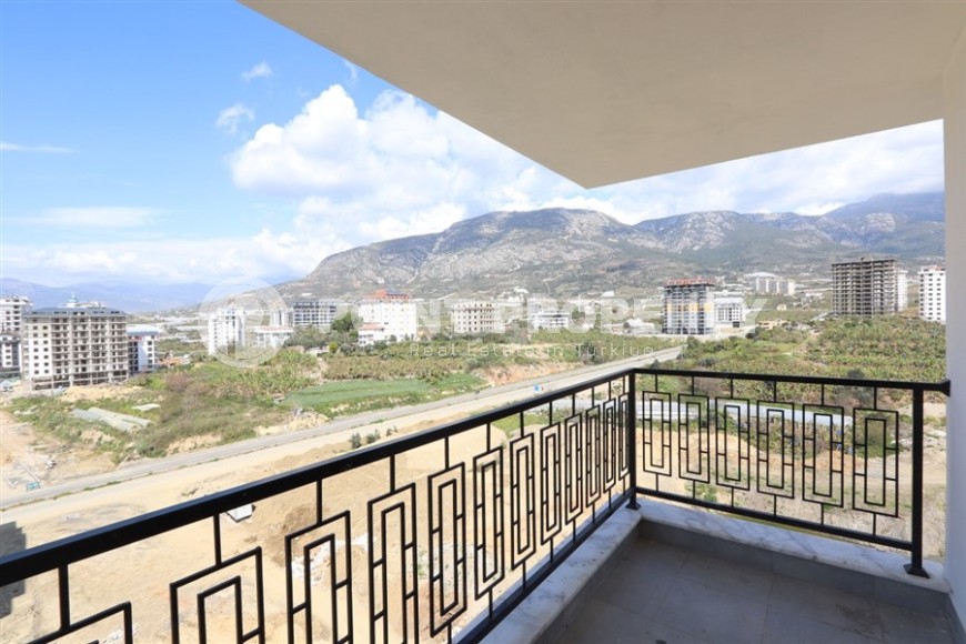 Современный дуплекс 100 м² с двумя спальнями и живописным видом в Махмутларе-id-8574-фото-11