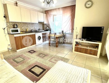 Квартира 1+1 с удобной локацией в районе Махмутлар-id-8576-фото-3