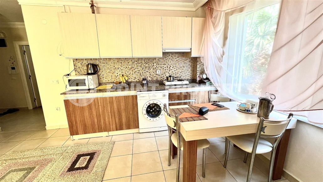 Квартира 1+1 с удобной локацией в районе Махмутлар-id-8576-фото-4