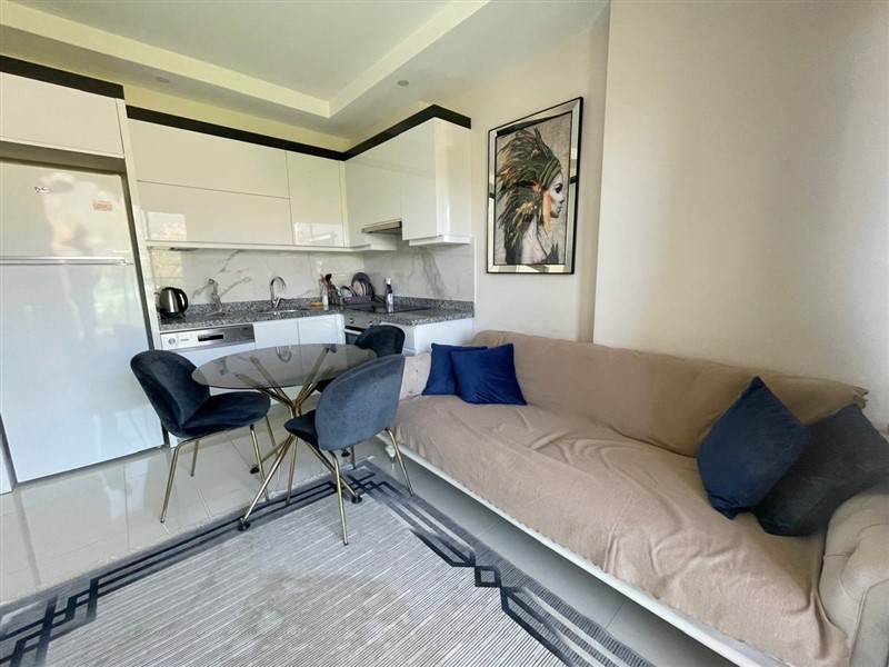 Меблированные апартаменты 50 м² в новом комплексе с хорошей инфраструктурой в Махмутларе-id-8577-фото-2