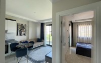 Меблированные апартаменты 50 м² в новом комплексе с хорошей инфраструктурой в Махмутларе-id-8577-photo-3