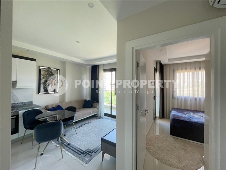 Меблированные апартаменты 50 м² в новом комплексе с хорошей инфраструктурой в Махмутларе-id-8577-фото-3