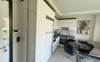 Меблированные апартаменты 50 м² в новом комплексе с хорошей инфраструктурой в Махмутларе-id-8577-photo-4