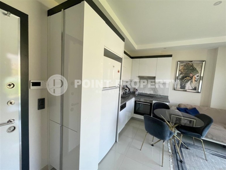 Меблированные апартаменты 50 м² в новом комплексе с хорошей инфраструктурой в Махмутларе-id-8577-фото-4