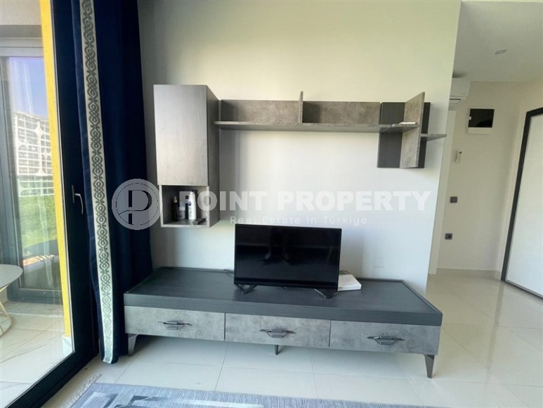 Меблированные апартаменты 50 м² в новом комплексе с хорошей инфраструктурой в Махмутларе-id-8577-фото-5