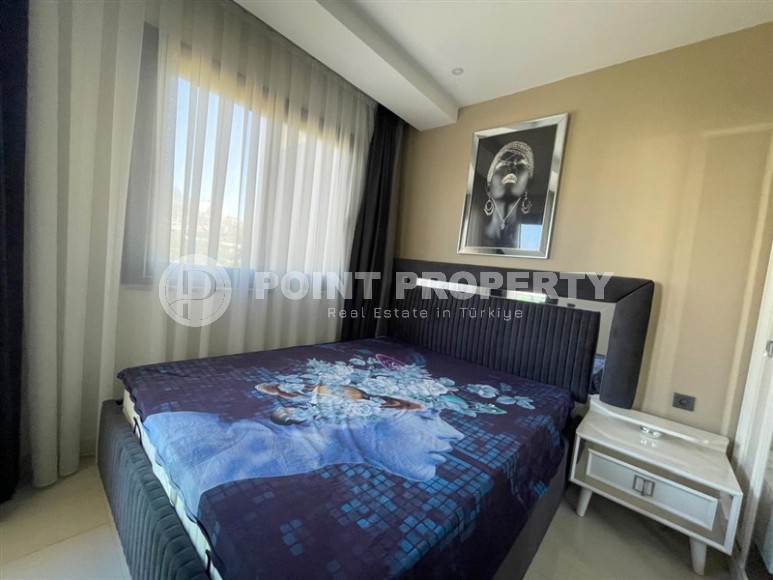 Меблированные апартаменты 50 м² в новом комплексе с хорошей инфраструктурой в Махмутларе-id-8577-фото-6