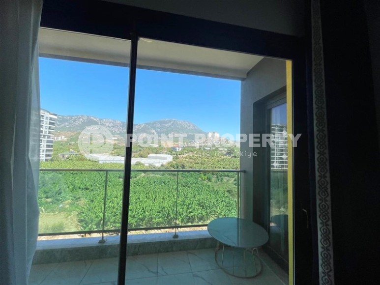 Меблированные апартаменты 50 м² в новом комплексе с хорошей инфраструктурой в Махмутларе-id-8577-фото-9