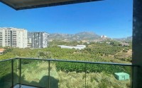Меблированные апартаменты 50 м² в новом комплексе с хорошей инфраструктурой в Махмутларе-id-8577-photo-10
