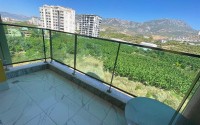 Меблированные апартаменты 50 м² в новом комплексе с хорошей инфраструктурой в Махмутларе-id-8577-photo-11
