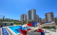 Меблированные апартаменты 50 м² в новом комплексе с хорошей инфраструктурой в Махмутларе-id-8577-photo-12