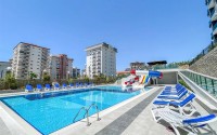 Меблированные апартаменты 50 м² в новом комплексе с хорошей инфраструктурой в Махмутларе-id-8577-photo-14