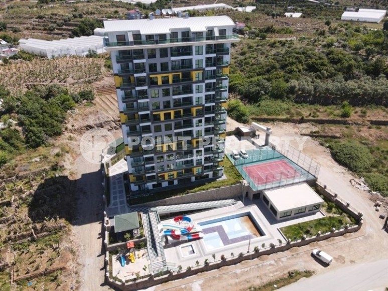 Меблированные апартаменты 50 м² в новом комплексе с хорошей инфраструктурой в Махмутларе-id-8577-фото-22