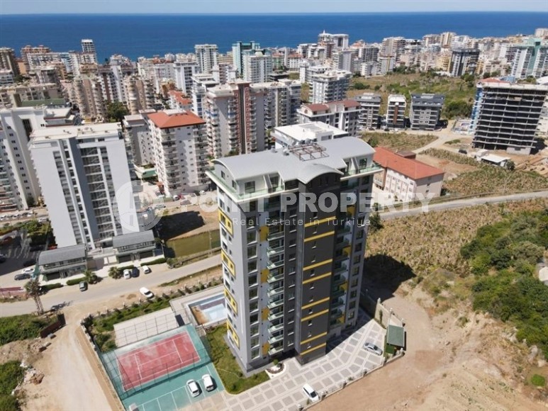 Меблированные апартаменты 50 м² в новом комплексе с хорошей инфраструктурой в Махмутларе-id-8577-photo-23