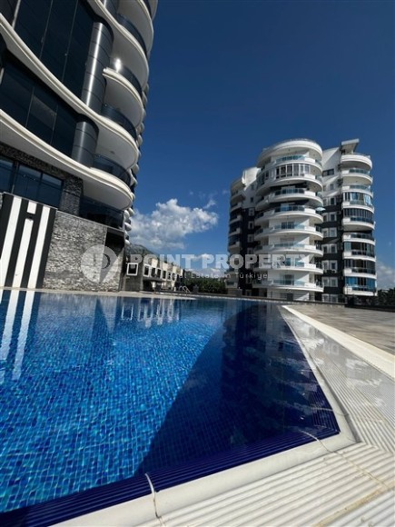 Роскошные апартаменты 105 м² с мебелью в Махмутларе-id-8578-photo-22