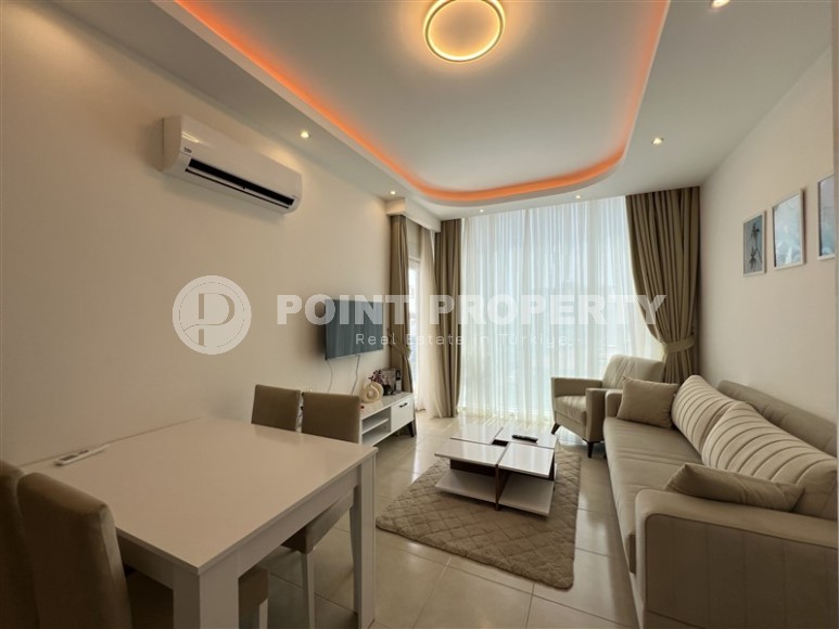 Светлая квартира 50 м² недалеко от моря в Махмутларе-id-8581-фото-2