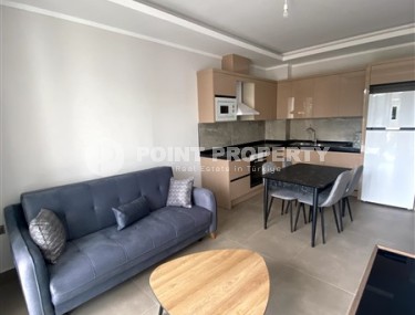 Меблированная квартира 45 м² в современном комплексе в Махмутларе-id-8582-photo-3