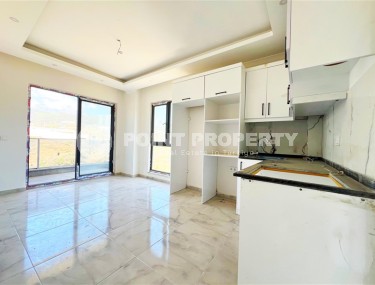 Современная квартира 50 м² в районе Демирташ: хорошая цена, новый комплекс-id-8585-фото-4