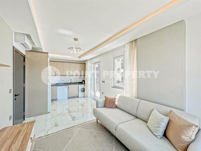 Современные апартаменты 75 м² в шаговой доступности от моря в Махмутларе-id-8590-фото-2