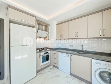 Современные апартаменты 75 м² в шаговой доступности от моря в Махмутларе-id-8590-photo-3