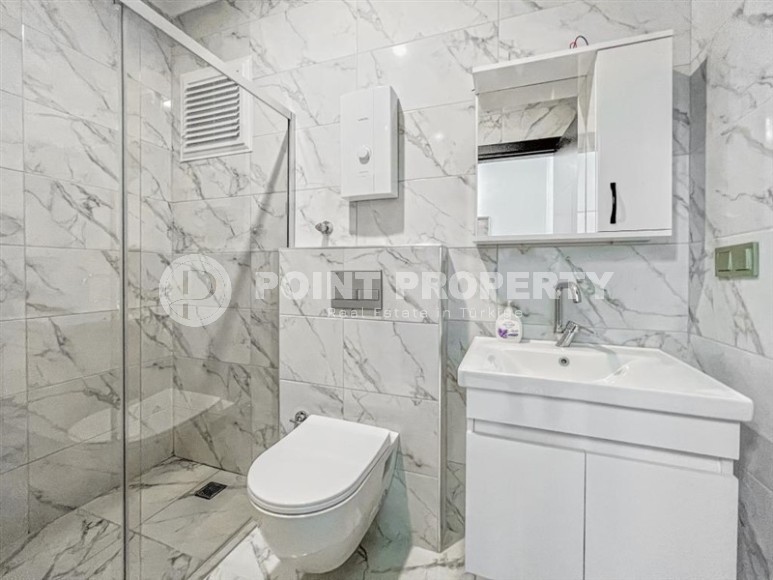 Современные апартаменты 75 м² в шаговой доступности от моря в Махмутларе-id-8590-фото-8