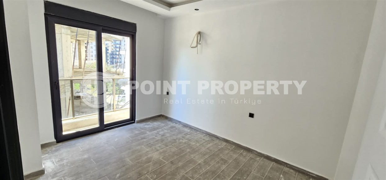 Новая квартира 50 м² по хорошей цене в Махмутларе-id-8596-фото-2