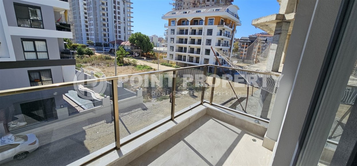 Новая квартира 50 м² по хорошей цене в Махмутларе-id-8596-фото-7