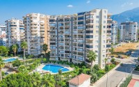 Двухуровневая квартира 125 м² рядом с морем в Махмутларе-id-8595-фото-1