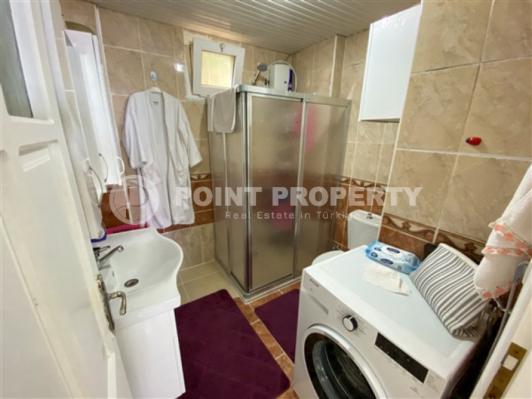 Меблированная квартира двумя спальнями, 95м², в доме городского типа в центре Алании-id-1671-фото-12