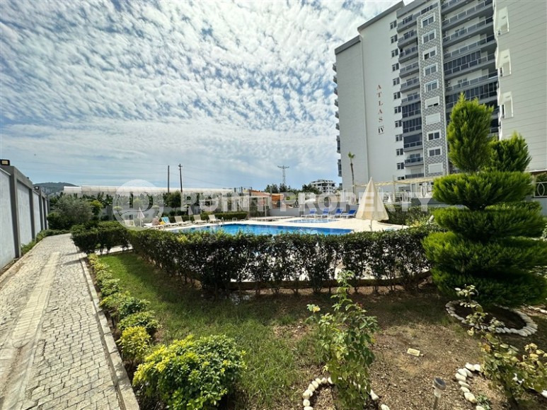 Современная квартира 60 м² с застекленным балконом в Махмутларе-id-8601-фото-12