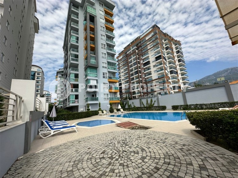 Современная квартира 60 м² с застекленным балконом в Махмутларе-id-8601-фото-14