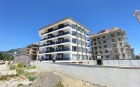 Современная квартира 56 м² вблизи от моря в районе Кестель-id-8610-photo-2
