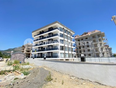 Современная квартира 56 м² вблизи от моря в районе Кестель-id-8610-фото-2