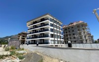 Современная квартира 56 м² вблизи от моря в районе Кестель-id-8610-photo-3