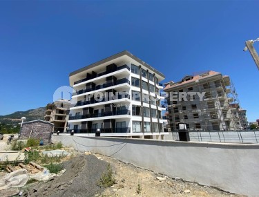 Современная квартира 56 м² вблизи от моря в районе Кестель-id-8610-фото-3