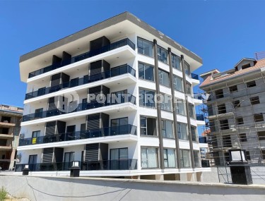 Современная квартира 56 м² вблизи от моря в районе Кестель-id-8610-photo-4