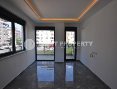 Инвестиционный проект в Алании в популярном районе Махмутлар. Двухкомнатные квартиры планировки 1+1, 54-59 м2, дуплексы 2+1, 3+1, 105-145м2 До моря 400 м.-id-1249-фото-2