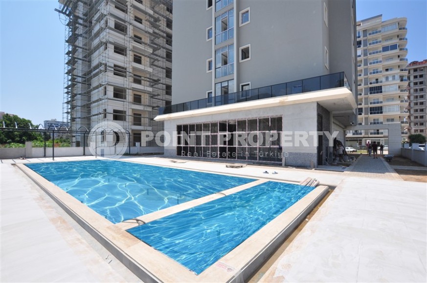 Investment project in Alanya in the popular Mahmutlar area. Two-room apartments with layout 1+1, 54-59 m2, duplexes 2+1, 3+1, 105-145 m2 400 m from the sea.-id-1249-photo-18