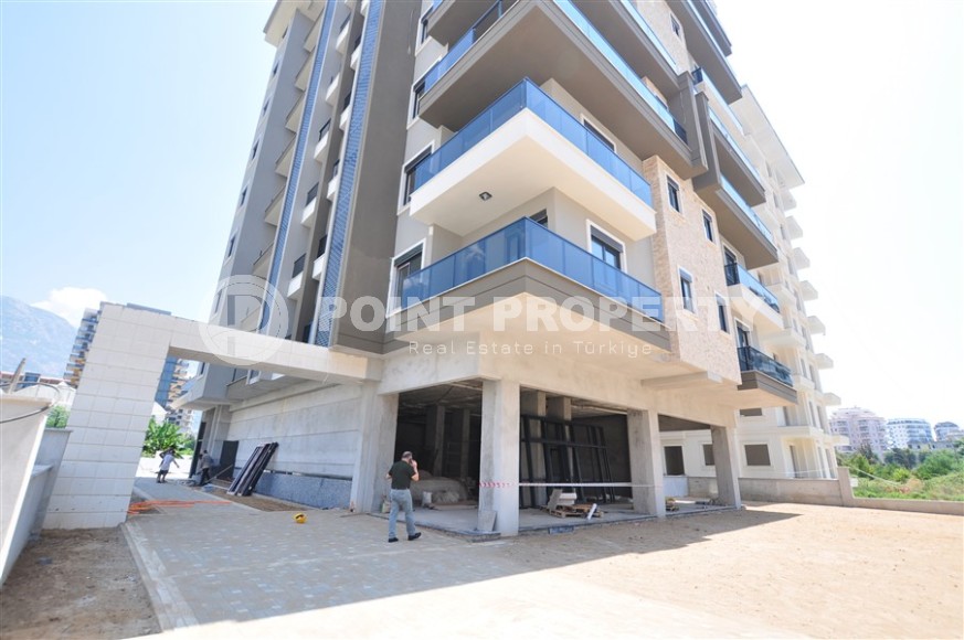 Investment project in Alanya in the popular Mahmutlar area. Two-room apartments with layout 1+1, 54-59 m2, duplexes 2+1, 3+1, 105-145 m2 400 m from the sea.-id-1249-photo-19