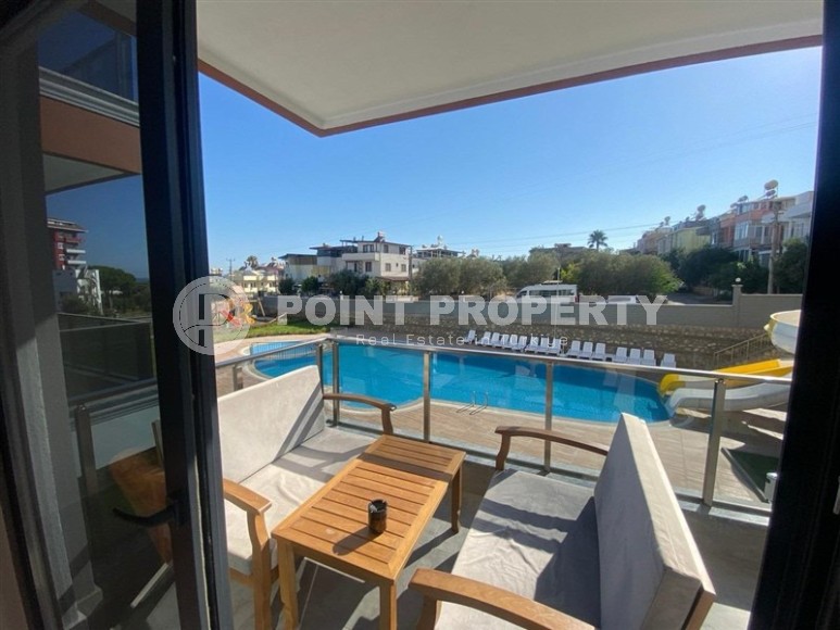 Уютная квартира 55 м² в комплексе с отельной инфраструктурой в Демирташ-id-8643-фото-11