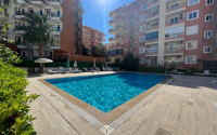 Large two bedroom apartment, 125m², in a cozy complex with a swimming pool, by the sea in Mahmutlar, Alanya-id-1675-photo-11