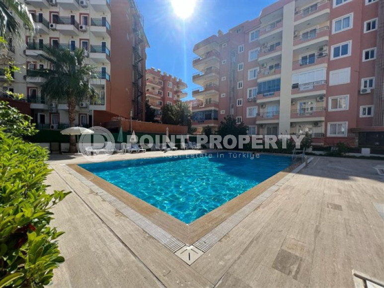 Large two bedroom apartment, 125m², in a cozy complex with a swimming pool, by the sea in Mahmutlar, Alanya-id-1675-photo-11