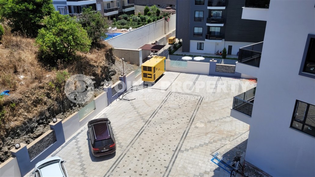 Новая квартира 47 м² в ультрасовременном комплексе Махмутлара-id-8650-фото-11