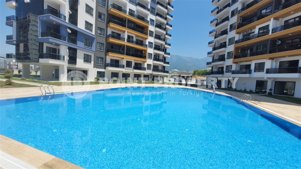 Новая квартира 47 м² в ультрасовременном комплексе Махмутлара-id-8650-фото-19