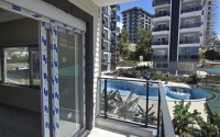 Новая квартира 55 м² по доступной цене в Авсалларе-id-8654-фото-9